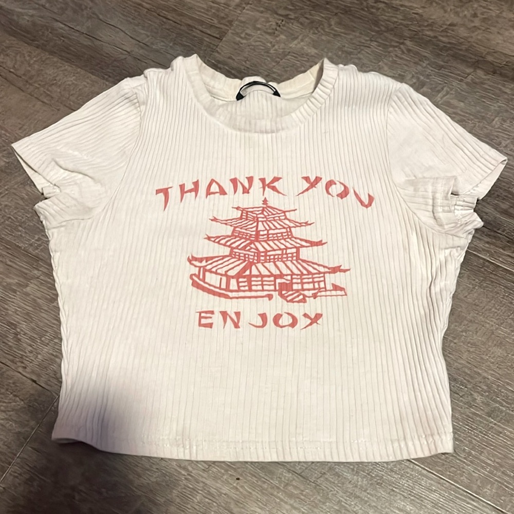 white tee with red writing